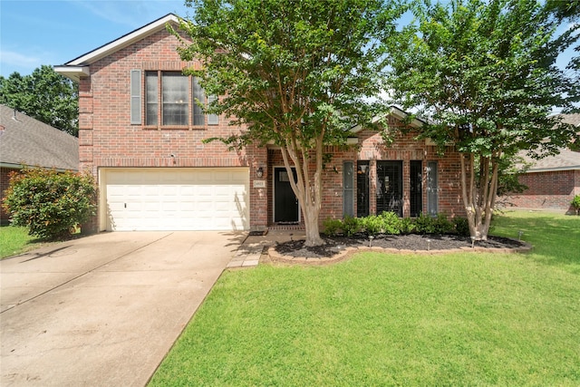 6923 Cobblestone Path, Houston, TX 77084 - view of front facade with brick siding, driveway, an attached garage, and a front yard