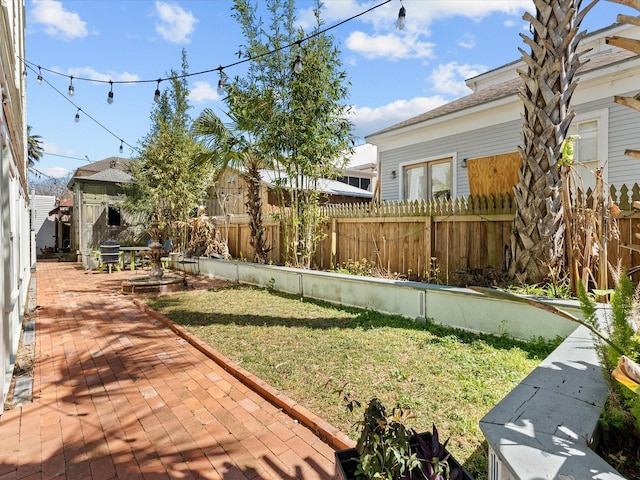 1014 20th St, Galveston, TX 77550 - view of yard featuring a patio