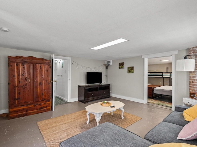 1014 20th St, Galveston, TX 77550 - living area with finished concrete floors and baseboards