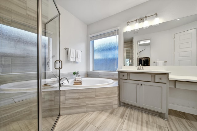 28172 Woodland Bend Way, Spring, TX 77386 - bathroom featuring vanity, a bath, and a shower stall
