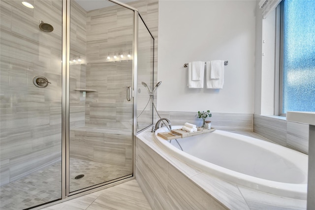 28172 Woodland Bend Way, Spring, TX 77386 - bathroom featuring a shower stall and a garden tub