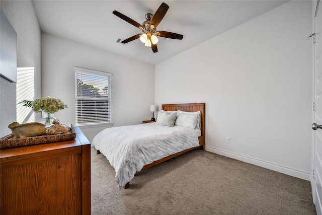28172 Woodland Bend Way, Spring, TX 77386 - bedroom with carpet floors, baseboards, and a ceiling fan