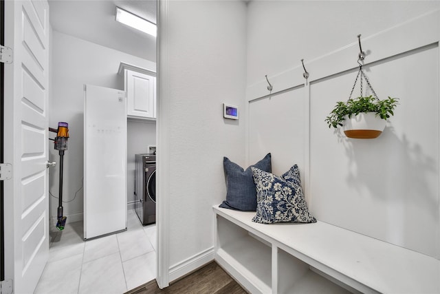28172 Woodland Bend Way, Spring, TX 77386 - mudroom with washer / dryer, baseboards, and light tile patterned flooring