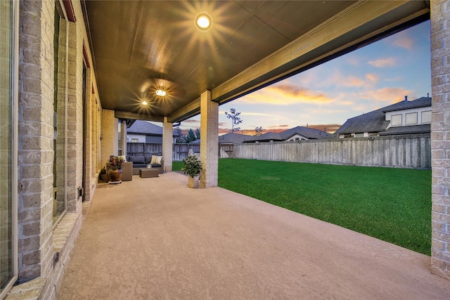 28172 Woodland Bend Way, Spring, TX 77386 - patio terrace at dusk with a patio area and an outdoor hangout area