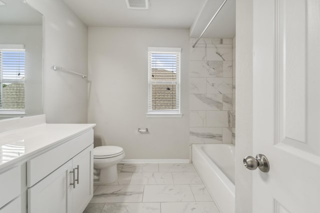 18318 Windy Knoll Way, Houston, TX 77084 - bathroom featuring marble finish flooring, vanity, toilet, baseboards, and shower / washtub combination