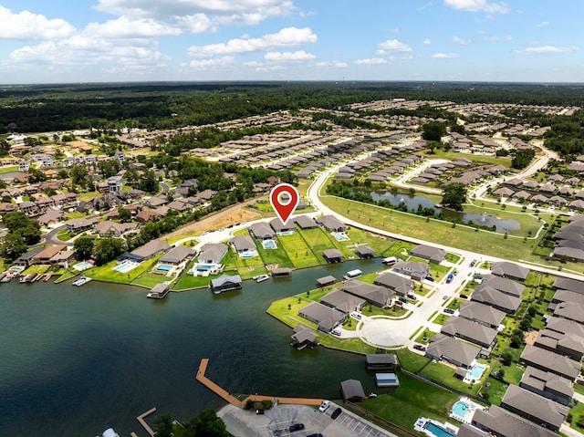 12211 Grey Plover Ct, Conroe, TX 77304 - aerial overview of property's location with a large body of water and nearby suburban area
