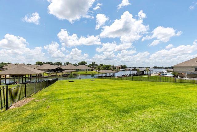 12211 Grey Plover Ct, Conroe, TX 77304 - view of yard with a residential view and a water view
