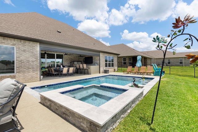 12211 Grey Plover Ct, Conroe, TX 77304 - view of swimming pool with a pool with connected hot tub, a ceiling fan, and a patio area