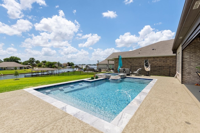 12211 Grey Plover Ct, Conroe, TX 77304 - view of pool featuring a pool with connected hot tub, a patio area, and a water view