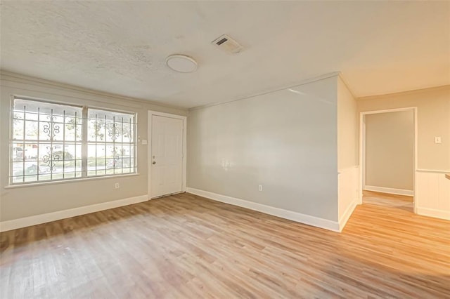 5102 Lyndhurst Dr, Houston, TX 77033 - spare room featuring light wood-type flooring and baseboards