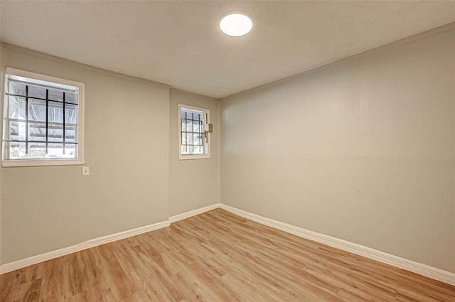5102 Lyndhurst Dr, Houston, TX 77033 - unfurnished room featuring baseboards and light wood-style floors