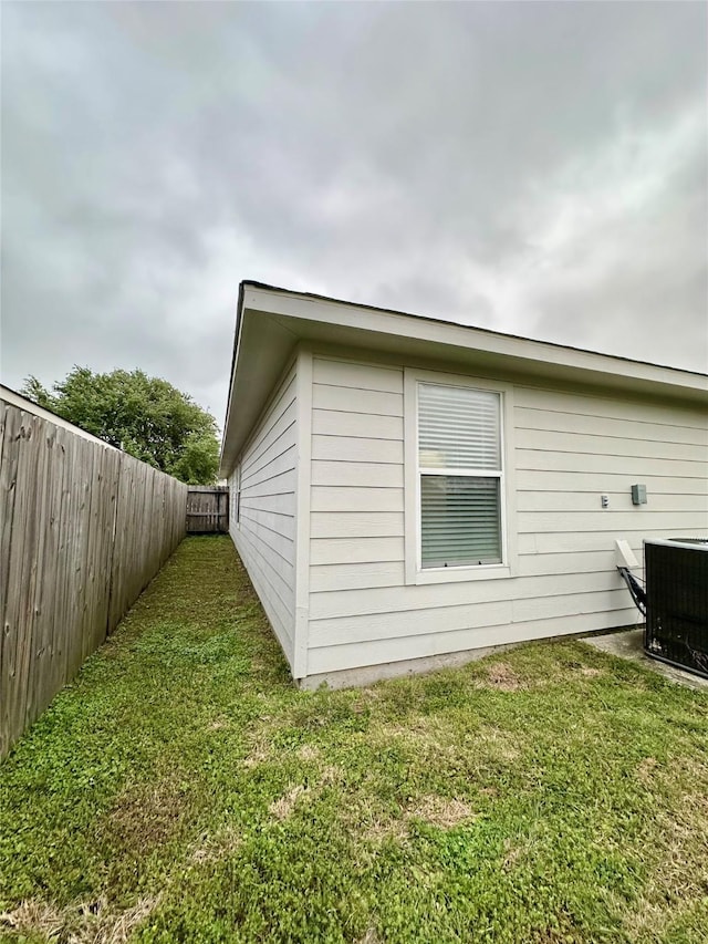 5642 Park Village Dr, Houston, TX 77048 - view of home's exterior featuring cooling unit