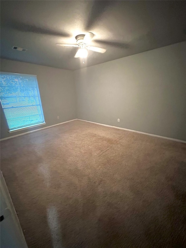 3918 Dalmatian Dr, Houston, TX 77045 - unfurnished room with a ceiling fan, carpet, and baseboards