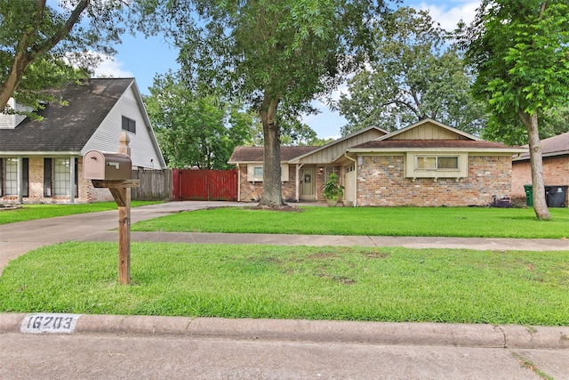16203 White Star Dr, Houston, TX 77062 - view of front of home with driveway and brick siding