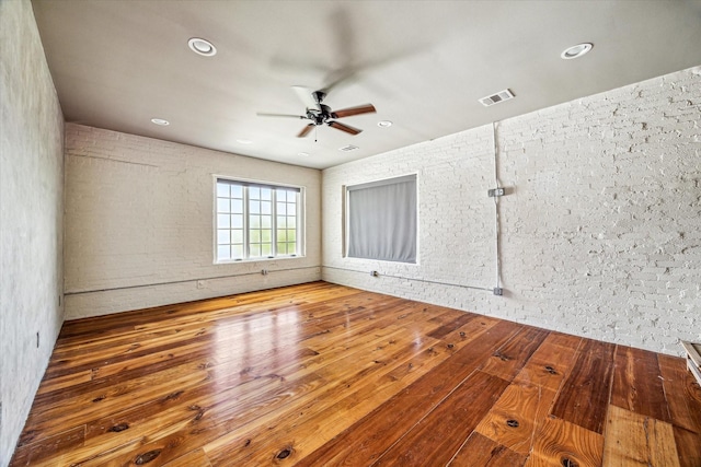 808 Coronado St, Houston, TX 77009 - empty room with a ceiling fan, wood finished floors, and recessed lighting