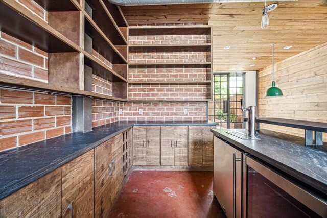 808 Coronado St, Houston, TX 77009 - indoor dry bar featuring beverage cooler and finished concrete floors