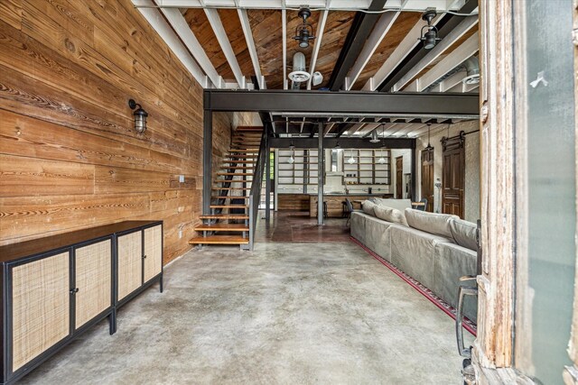 808 Coronado St, Houston, TX 77009 - basement featuring wooden walls and stairway