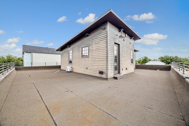 808 Coronado St, Houston, TX 77009 - view of property exterior with a cooling unit and a patio