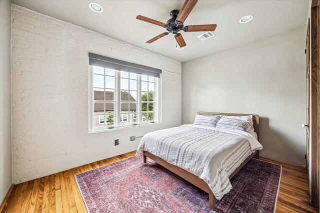 808 Coronado St, Houston, TX 77009 - bedroom featuring wood finished floors, a ceiling fan, and recessed lighting