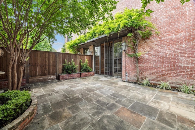 808 Coronado St, Houston, TX 77009 - fenced backyard with a patio area