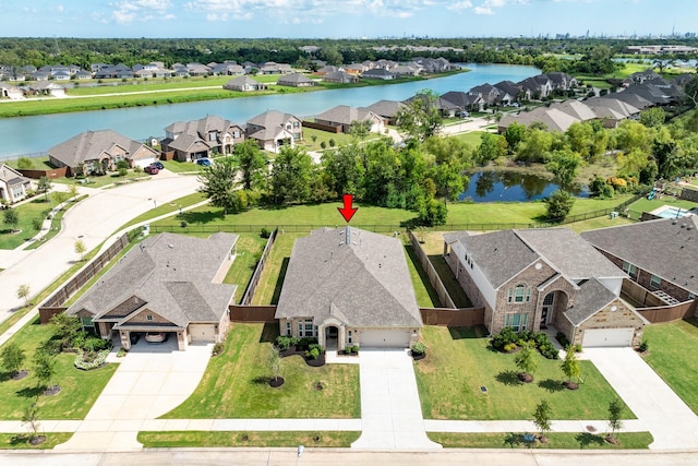 203 Bentwater Ln, Clute, TX 77531 - aerial perspective of suburban area featuring a large body of water
