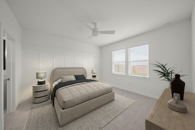 8335 Bay Oaks Dr, Baytown, TX 77523 - bedroom with light carpet and a ceiling fan
