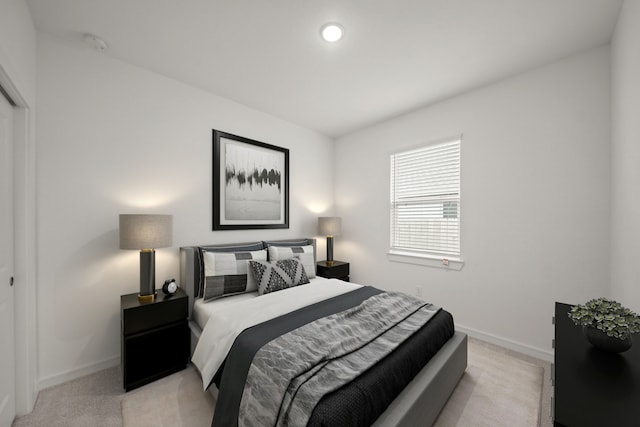8335 Bay Oaks Dr, Baytown, TX 77523 - bedroom featuring light colored carpet and baseboards
