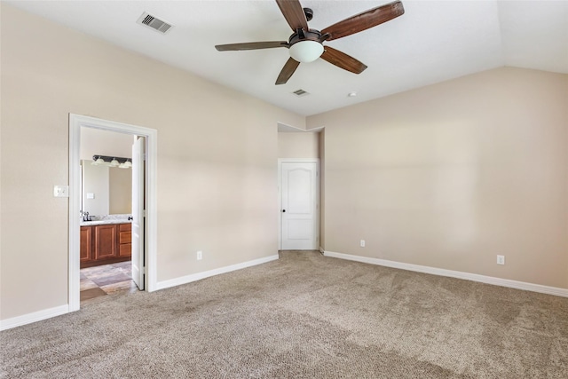1511 Tournament Ct, Crosby, TX 77532 - unfurnished bedroom with light carpet, baseboards, lofted ceiling, ensuite bath, and a ceiling fan