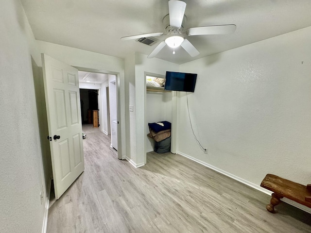 11837 13th St, Santa Fe, TX 77510 - unfurnished bedroom with attic access, light wood finished floors, baseboards, a closet, and ceiling fan