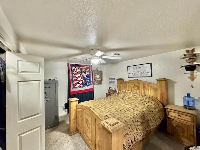 11837 13th St, Santa Fe, TX 77510 - bedroom featuring light carpet, a textured ceiling, and a ceiling fan