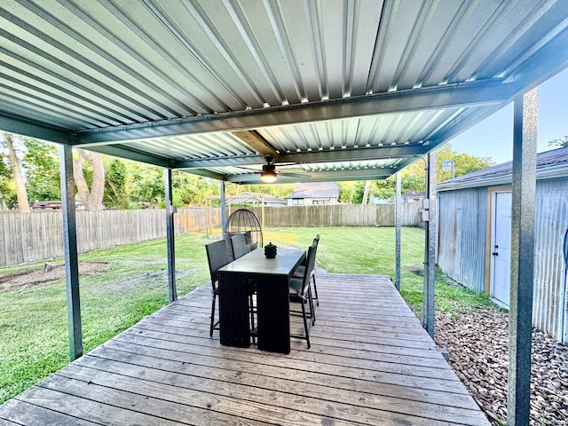 11837 13th St, Santa Fe, TX 77510 - deck with outdoor dining area and ceiling fan