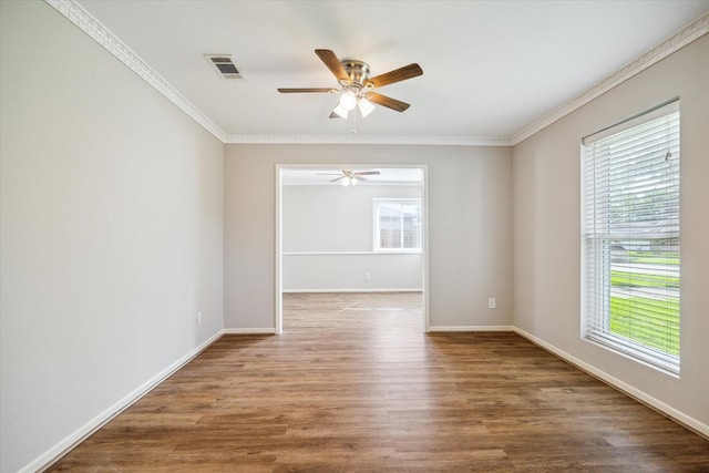 13603 Woodchester Dr, Sugar Land, TX 77498 - spare room with ceiling fan, crown molding, and wood finished floors