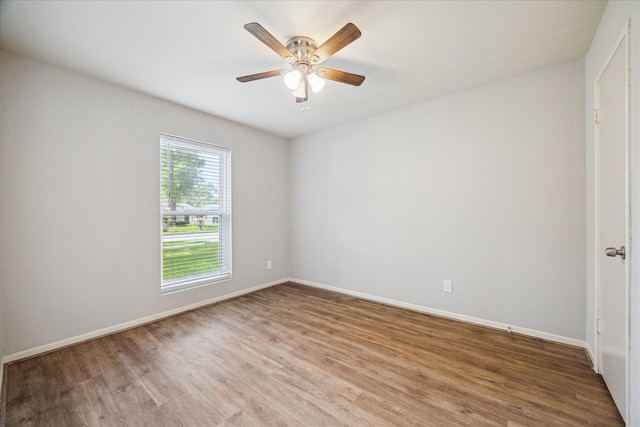 13603 Woodchester Dr, Sugar Land, TX 77498 - spare room with wood finished floors and ceiling fan