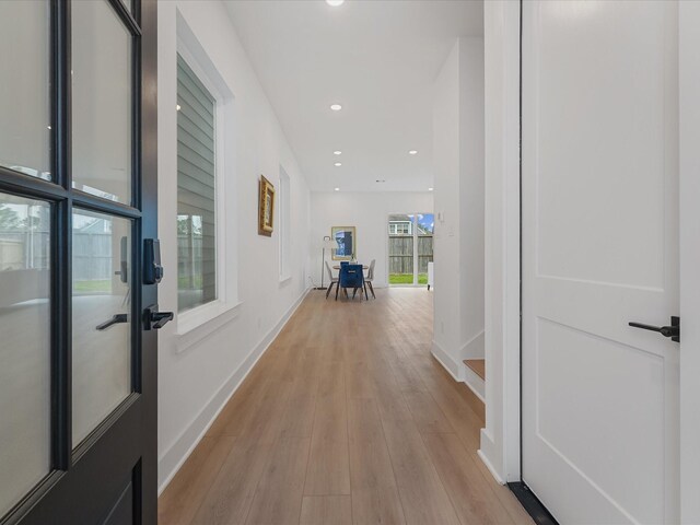 5016 Golden Forest Dr, Houston, TX 77091 - hall with baseboards, light wood-type flooring, and recessed lighting