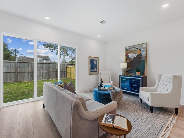 5016 Golden Forest Dr, Houston, TX 77091 - living area featuring light wood-style floors, recessed lighting, and baseboards