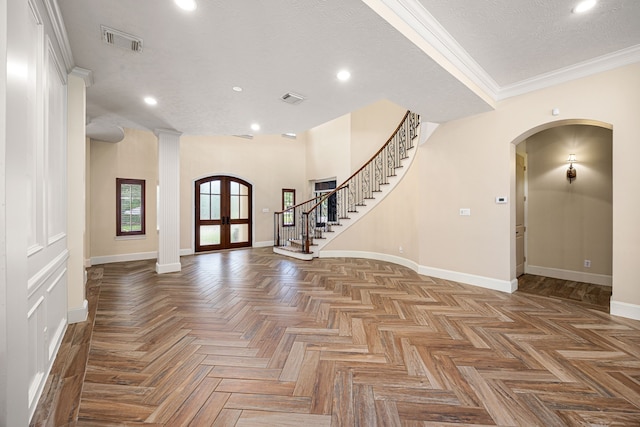 24914 Misty Heath Ln, Katy, TX 77494 - entrance foyer featuring arched walkways, french doors, baseboards, stairs, and recessed lighting