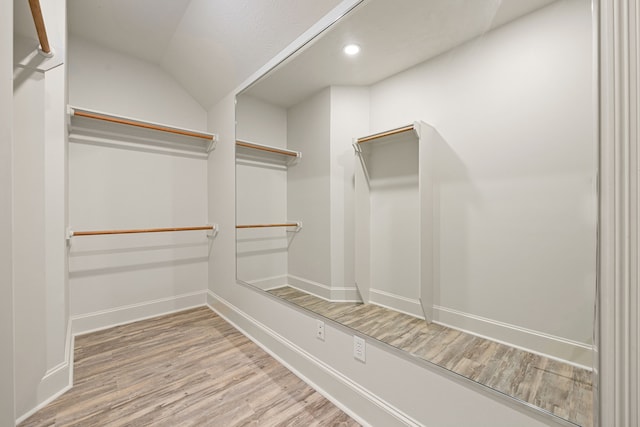 24914 Misty Heath Ln, Katy, TX 77494 - spacious closet with wood finished floors and vaulted ceiling
