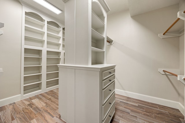 24914 Misty Heath Ln, Katy, TX 77494 - walk in closet featuring wood finished floors