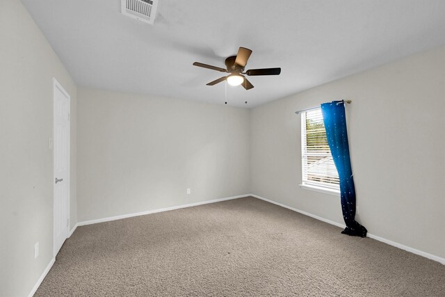 6606 Chancellor Dr, Spring, TX 77379 - empty room featuring carpet floors, ceiling fan, and baseboards