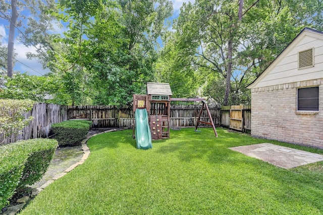 6606 Chancellor Dr, Spring, TX 77379 - view of yard featuring a playground