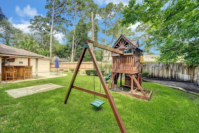 6606 Chancellor Dr, Spring, TX 77379 - view of playground featuring a patio area