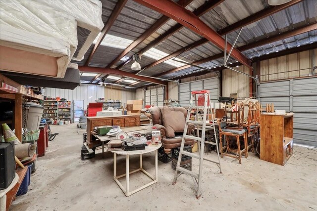 2432 Westpine Rd, Beaumont, TX 77713 - garage featuring a workshop area and metal wall