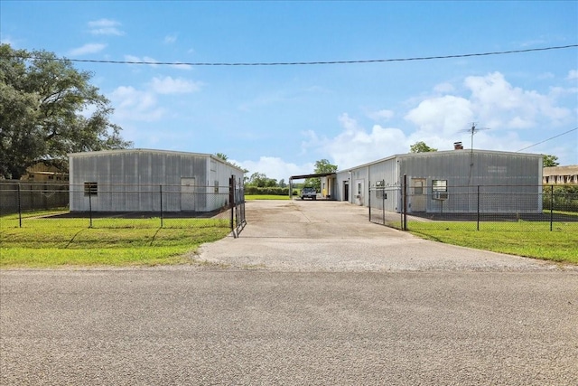 2432 Westpine Rd, Beaumont, TX 77713 - view of asphalt driveway featuring a gated entry