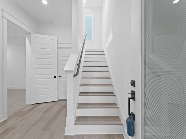 1266-1264 Finnigan St, Houston, TX 77020 - staircase with wood finished floors, recessed lighting, and baseboards