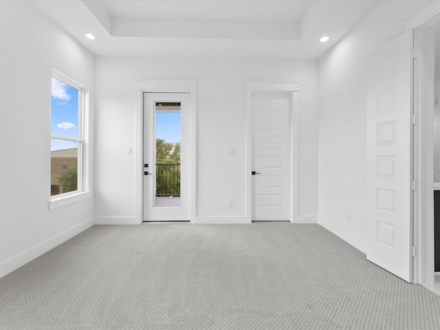 1266-1264 Finnigan St, Houston, TX 77020 - carpeted spare room with recessed lighting, baseboards, and a tray ceiling