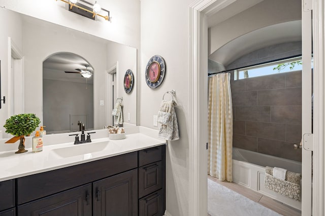 1003 Angel Forest Ct, Pinehurst, TX 77362 - bathroom featuring a ceiling fan, vanity, shower / bath combo with shower curtain, and tile patterned floors