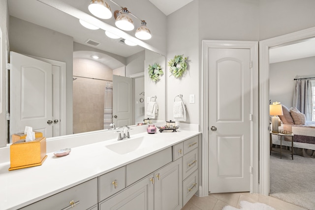 1003 Angel Forest Ct, Pinehurst, TX 77362 - ensuite bathroom with vanity, a shower, and tile patterned flooring