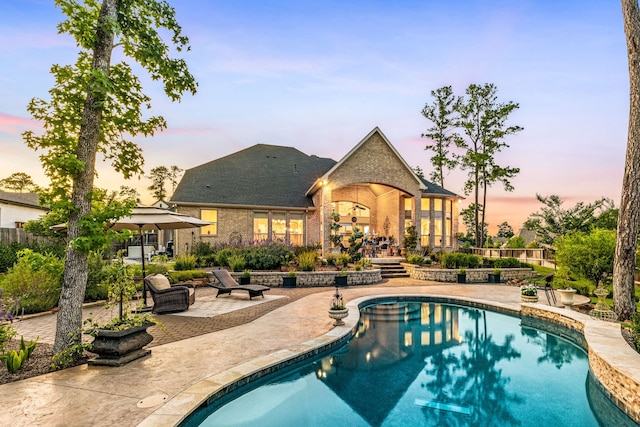 1003 Angel Forest Ct, Pinehurst, TX 77362 - outdoor pool with a patio area