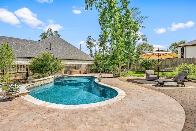 1003 Angel Forest Ct, Pinehurst, TX 77362 - view of pool with a patio area and a fenced backyard