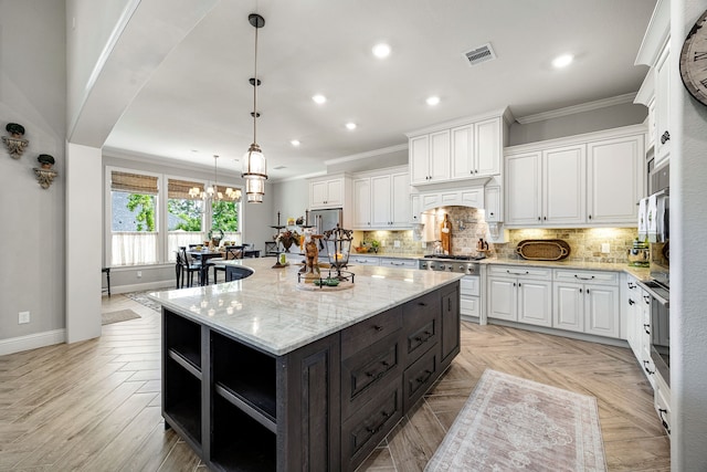 1003 Angel Forest Ct, Pinehurst, TX 77362 - kitchen featuring open shelves, white cabinets, ornamental molding, a spacious island, and decorative backsplash